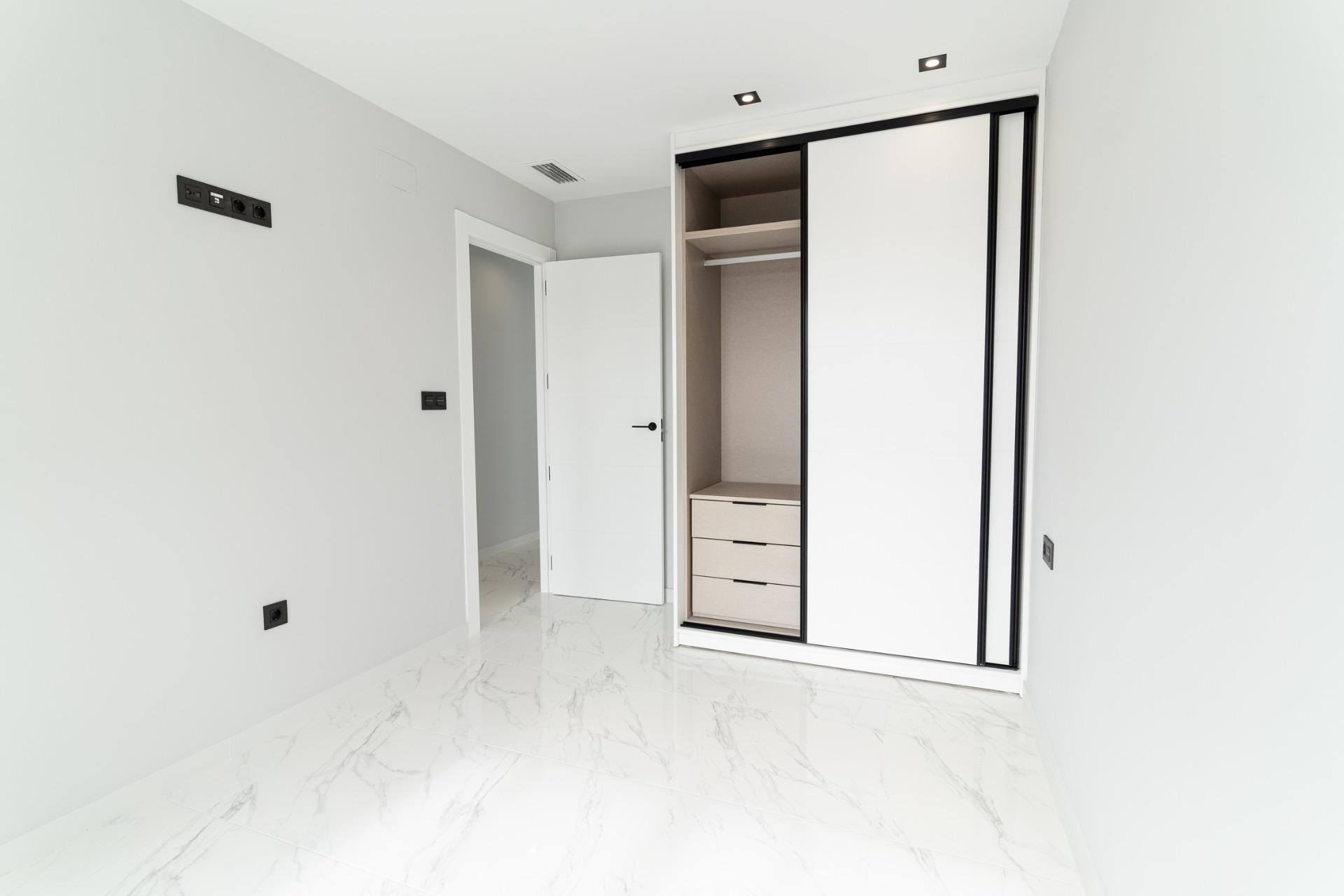 Новое здание - Villa -
Orihuela Costa - Punta Prima